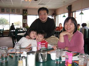 Susan, Yiu-Yin and their two children. 